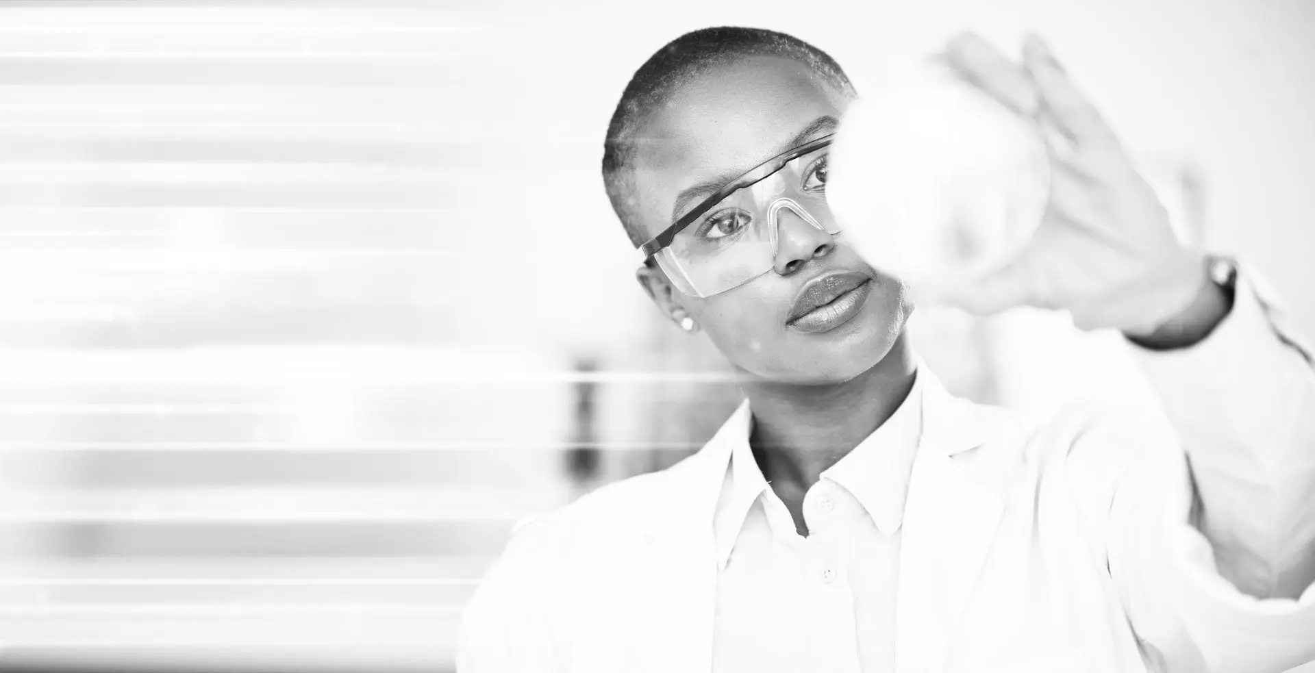 A scientist performing clinical research, representing our research-driven foundation and commitment to scientific excellence